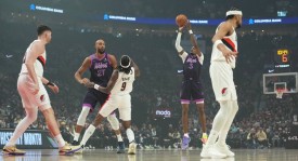 爱德华兹34分麦丹29分 森林狼险胜开拓者